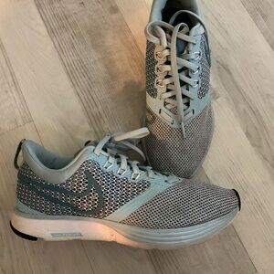 Nike Gray Athletic Shoes with Breathable Mesh and Cushioning